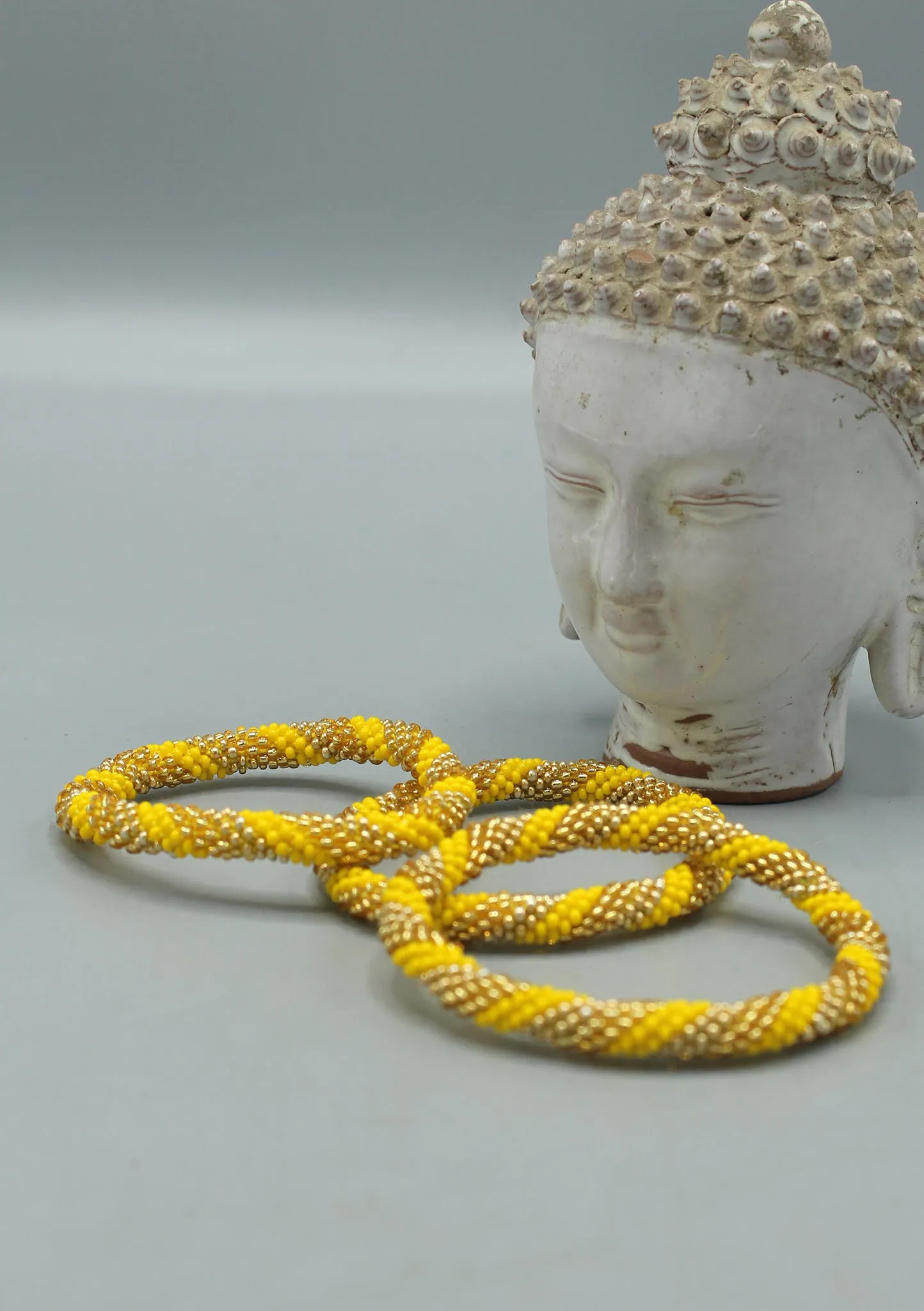 Bright Yellow and Golden Beads Nepalese Roll on Bracelet