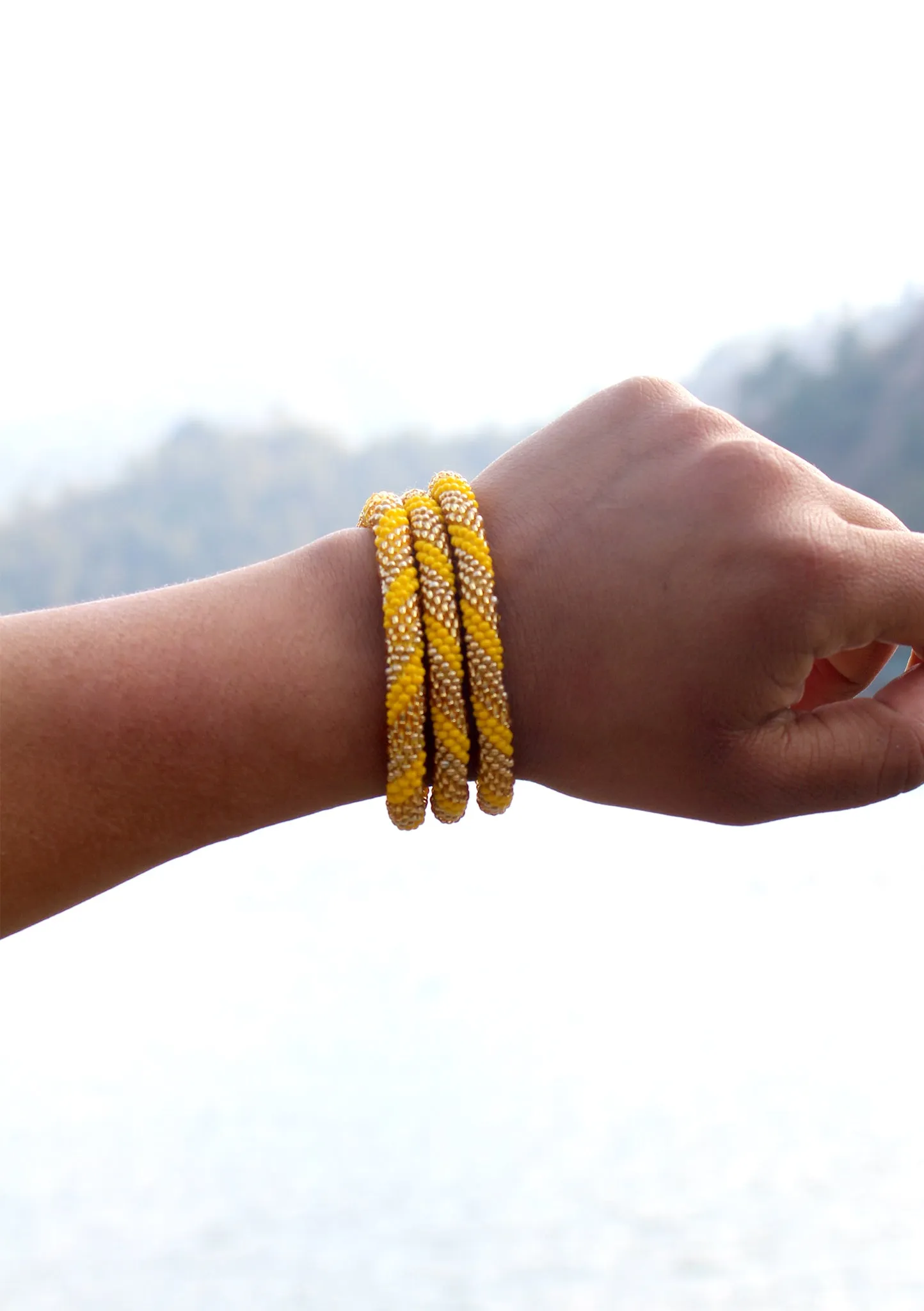 Bright Yellow and Golden Beads Nepalese Roll on Bracelet