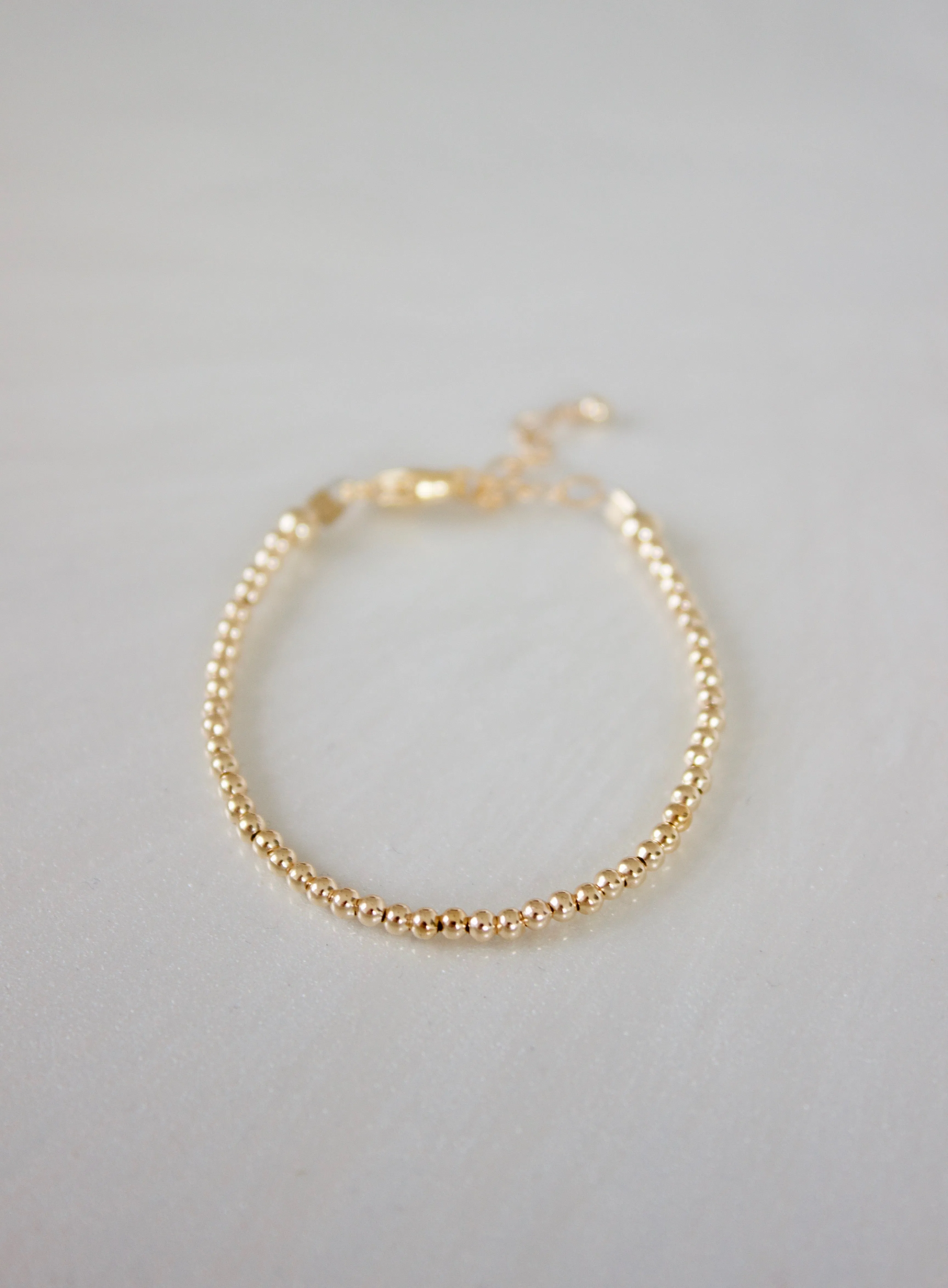 PETITE GOLD BABY BRACELET