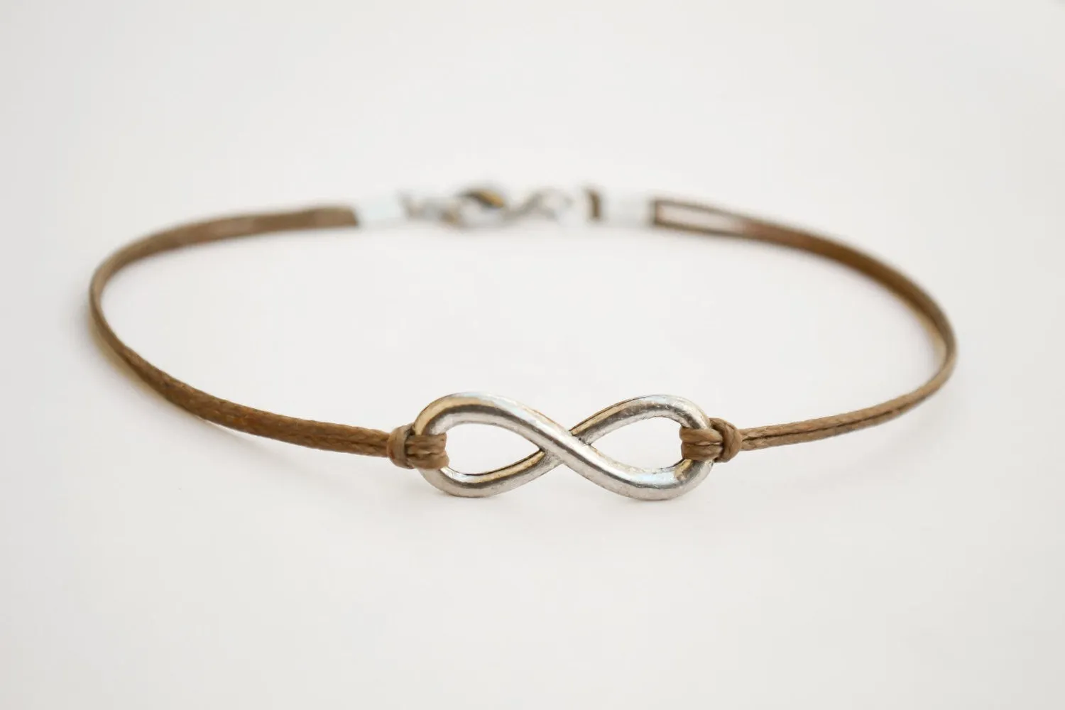 Silver Infinity bracelet for men, brown cord, yoga jewelry