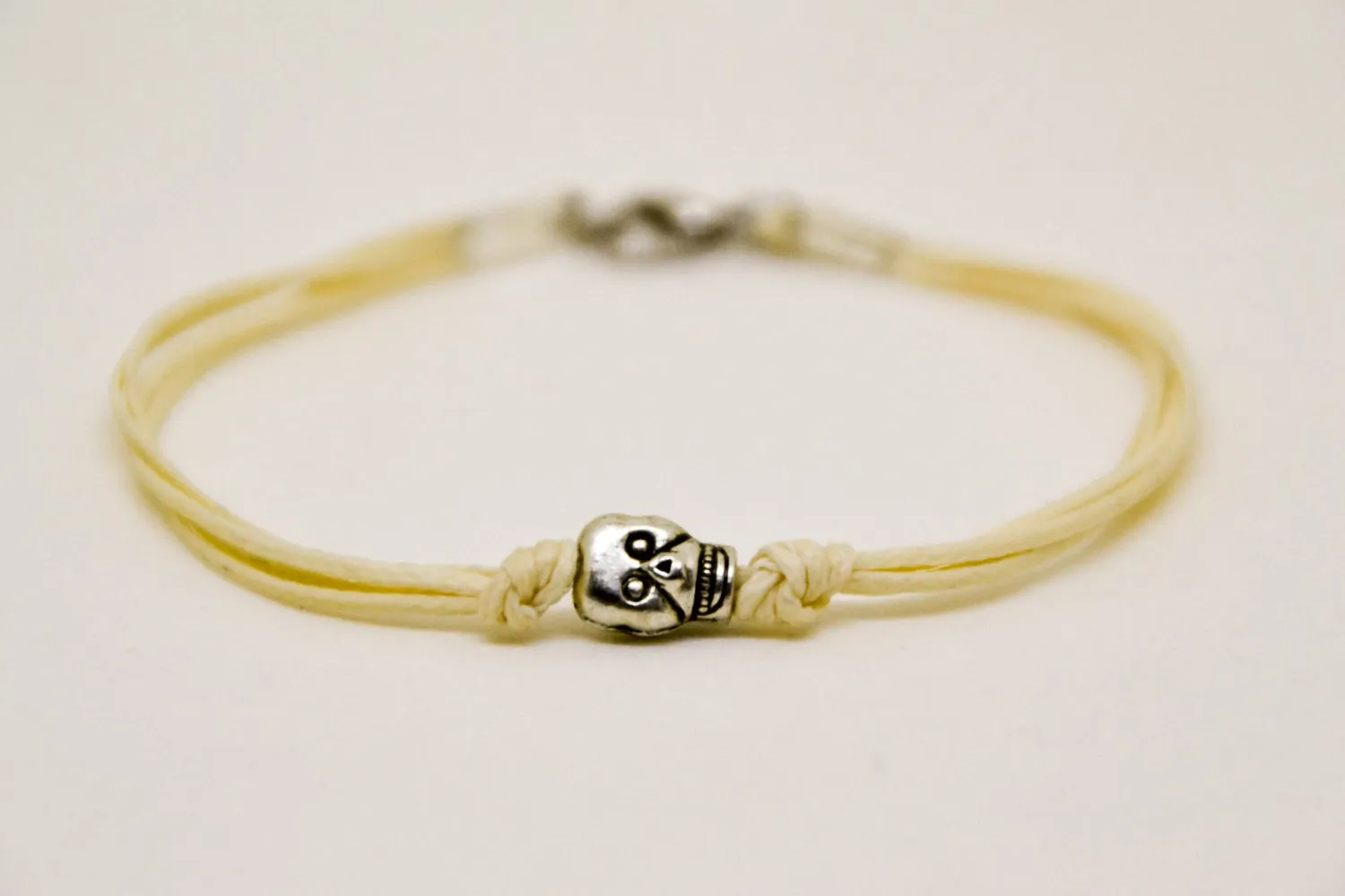 Silver skull bead bracelet for men, beige cord, handmade gift for him