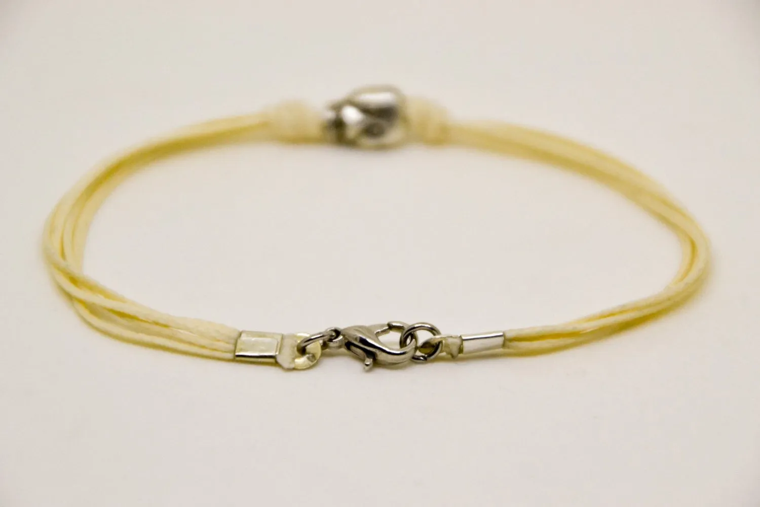 Silver skull bead bracelet for men, beige cord, handmade gift for him