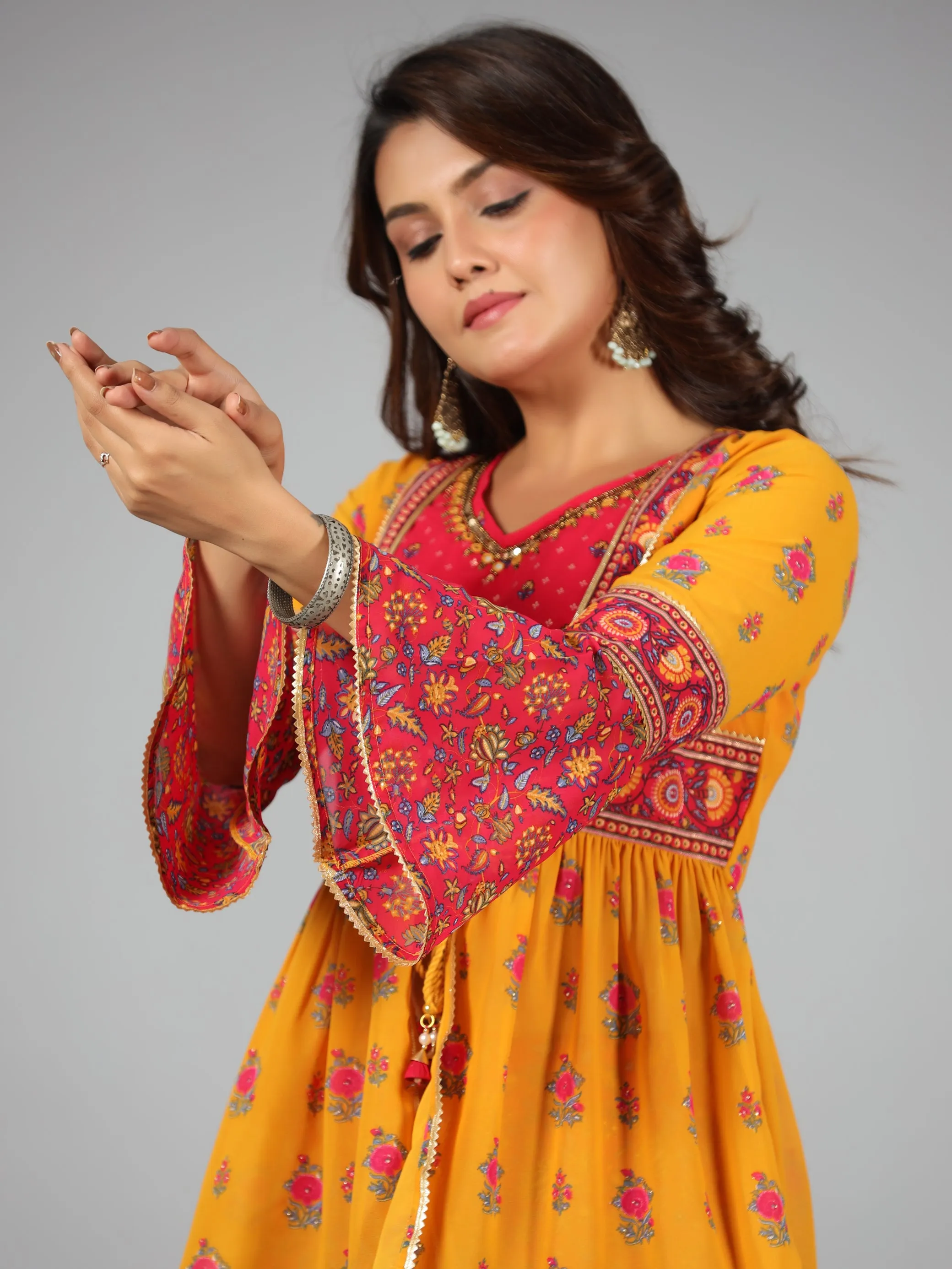 Women Mustard Georgette Printed Clothing Set