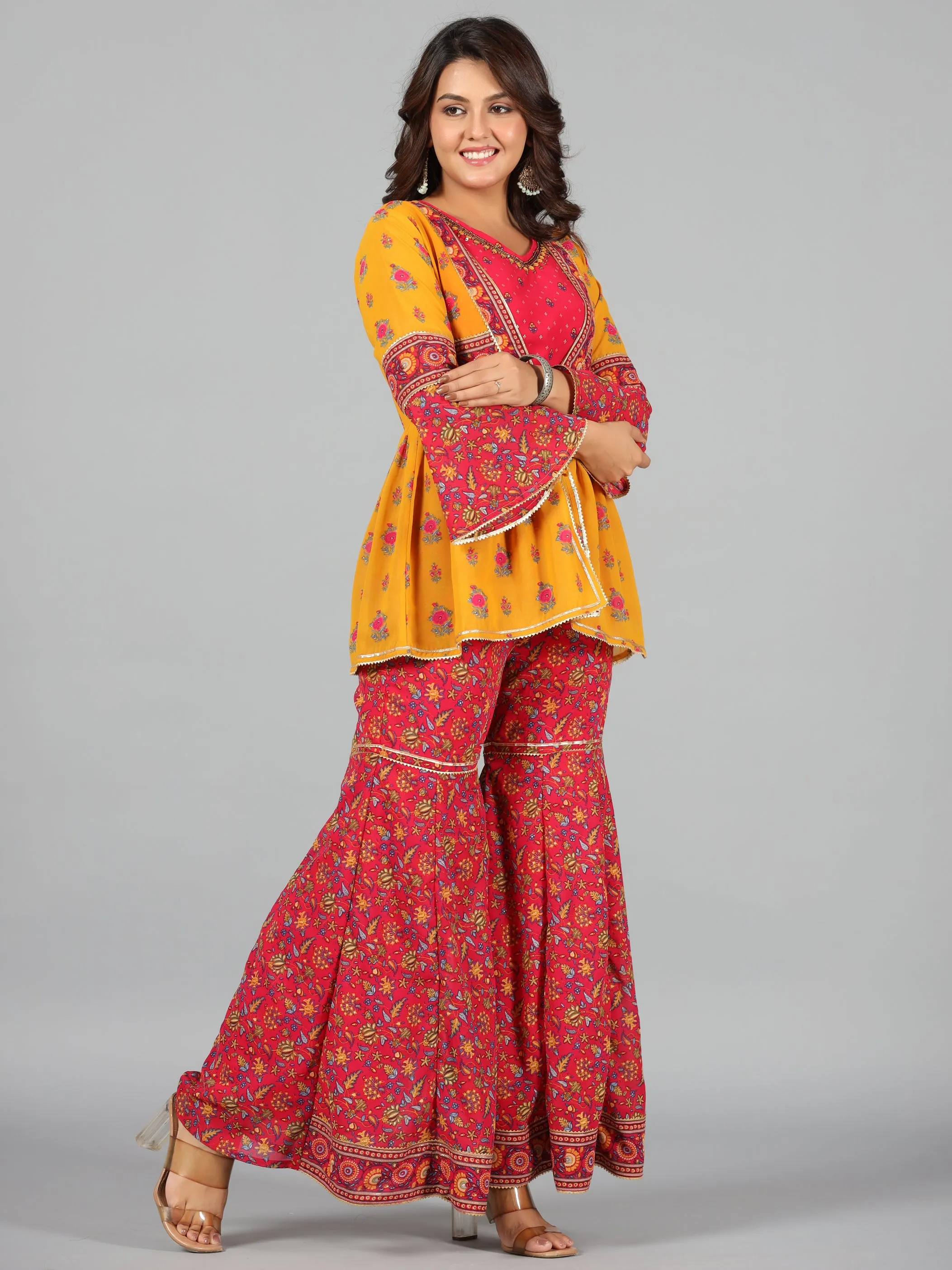 Women Mustard Georgette Printed Clothing Set